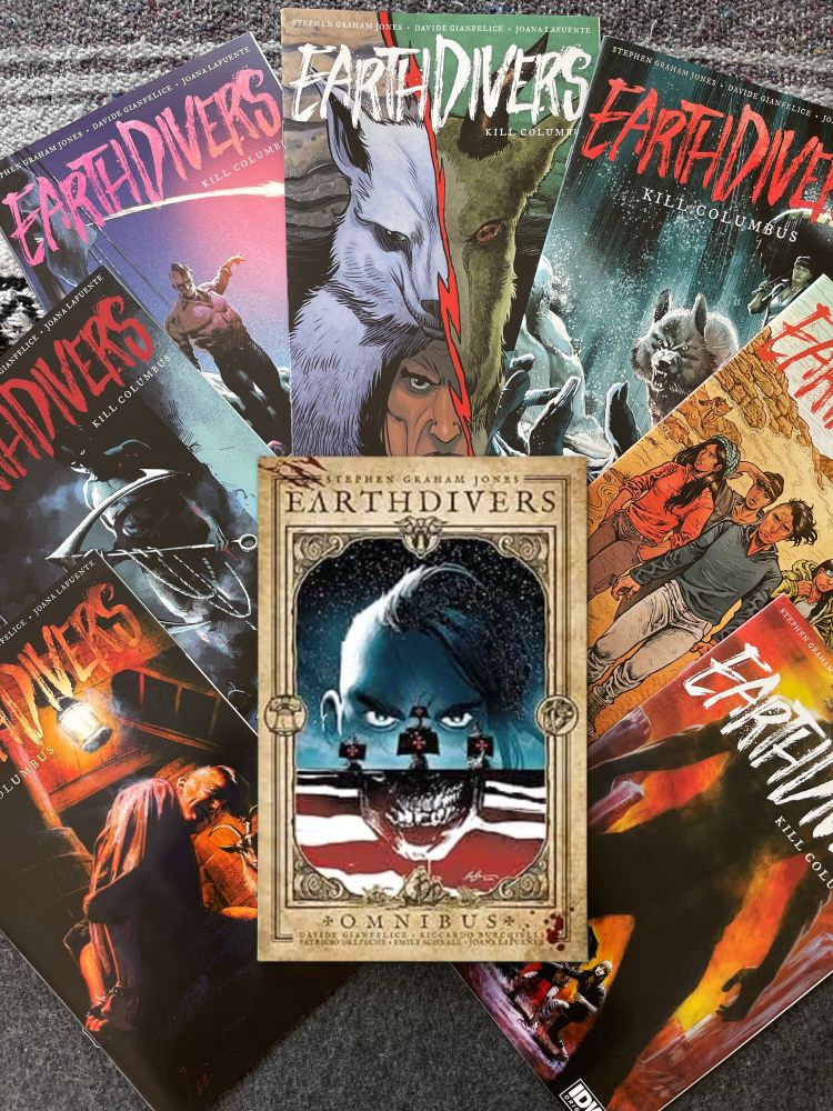 Earthdivers omnibus in the center of all the comics