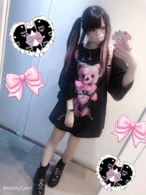 a person wearing a black menhera coord