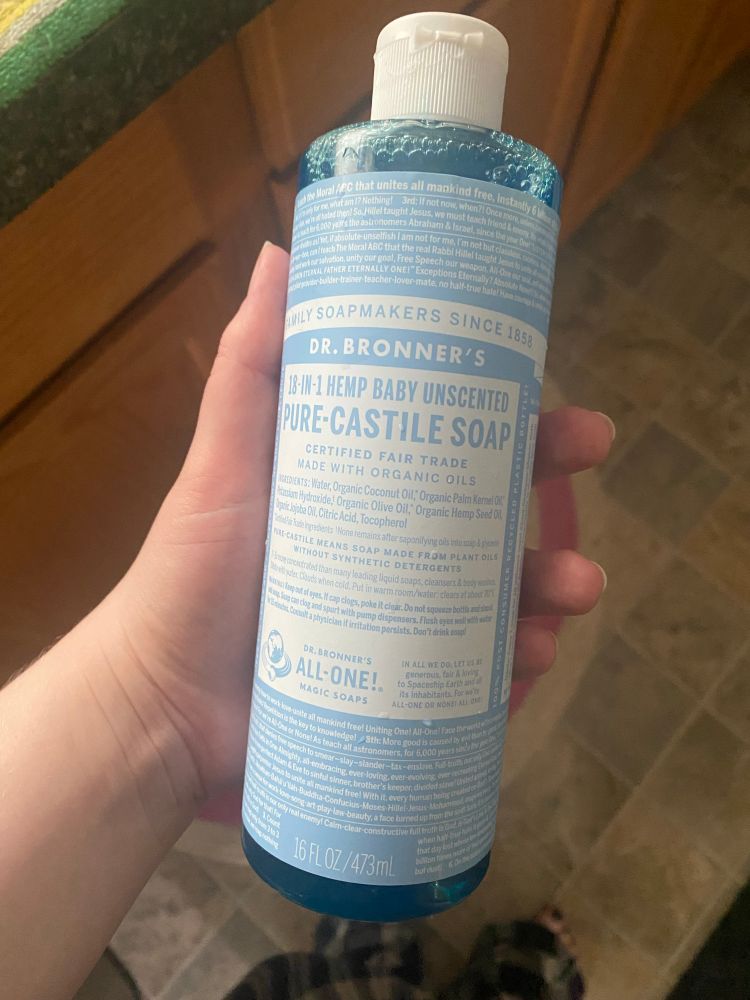 A photo of a dr bronners soap bottle filled with dawn dish soap