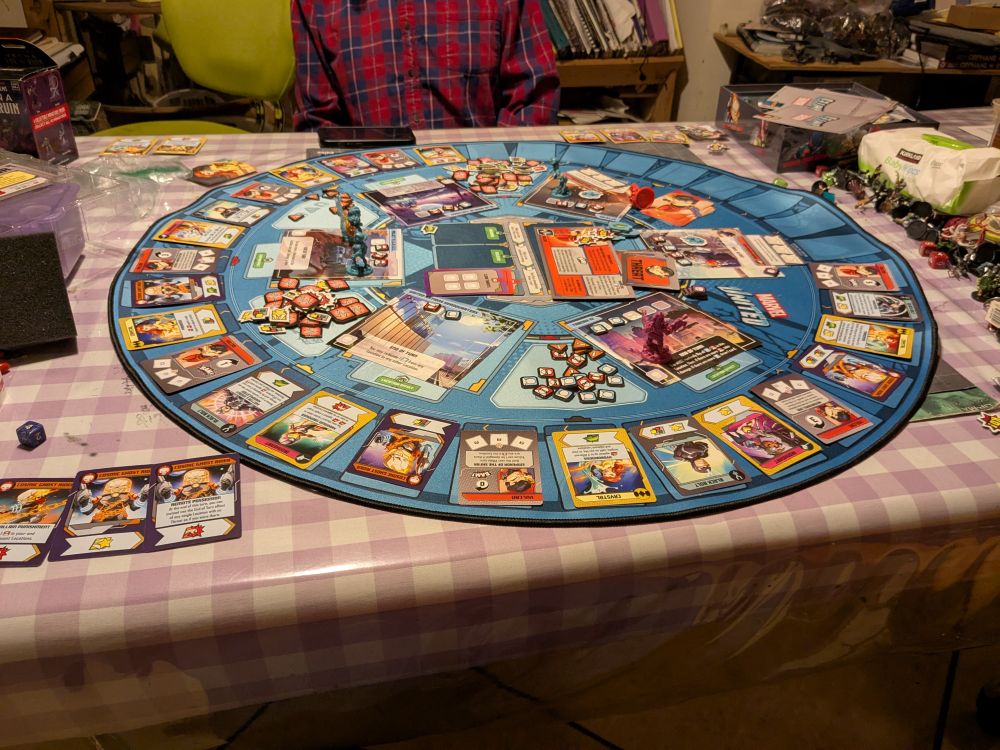 A game of Marvel United at end game. Black bolt, Crystal, Ironheart, and Cosmic Ghost Rider defeating Vulcan super villain.