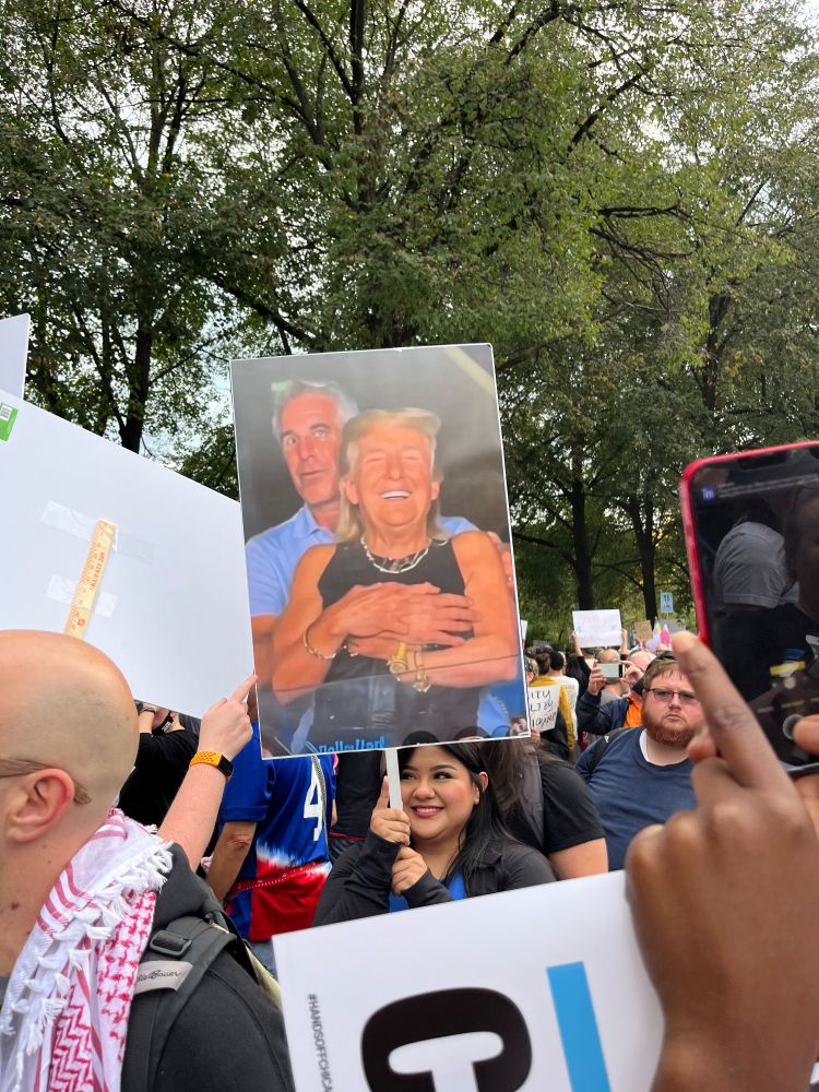 Epstein hugging Trump from behind (photoshopped)