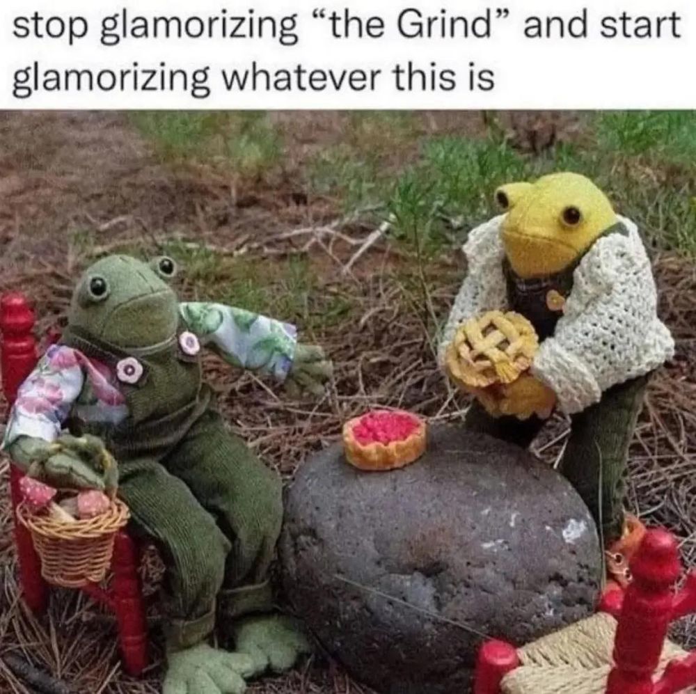 frog and toad having a picnic with a rock table
the caption at the top reads "stop glamorizing 'the Grind' and start glamorizing whatever this is.