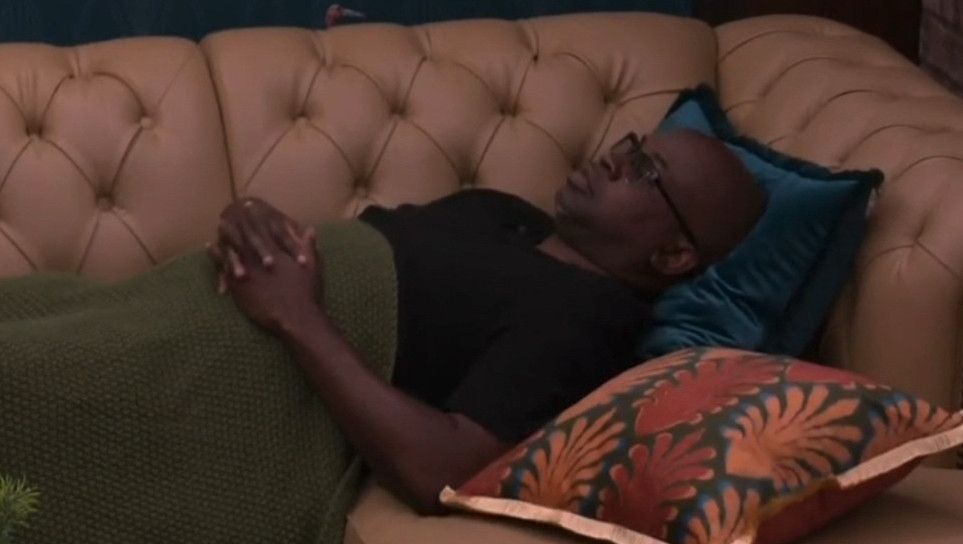 Captain Will relaxing on a couch in the BB27 house.