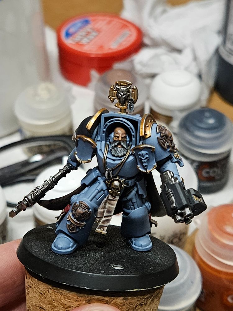 Space Wolf miniature with sculpted beard and necklace