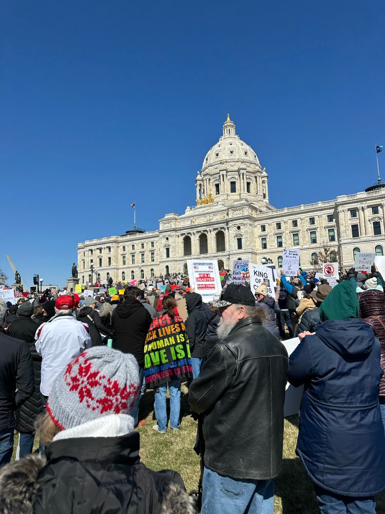 Quick shot from crowd of MN state capitol building with protesters