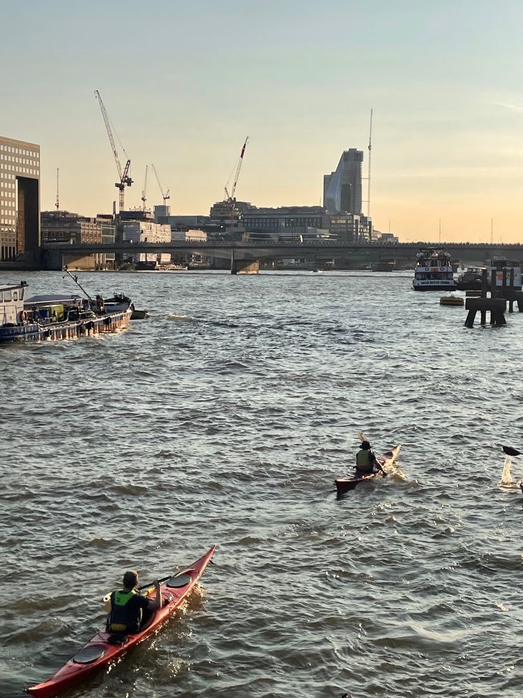An aerial shot of two kayakers in the Thames. Im on the bottom left