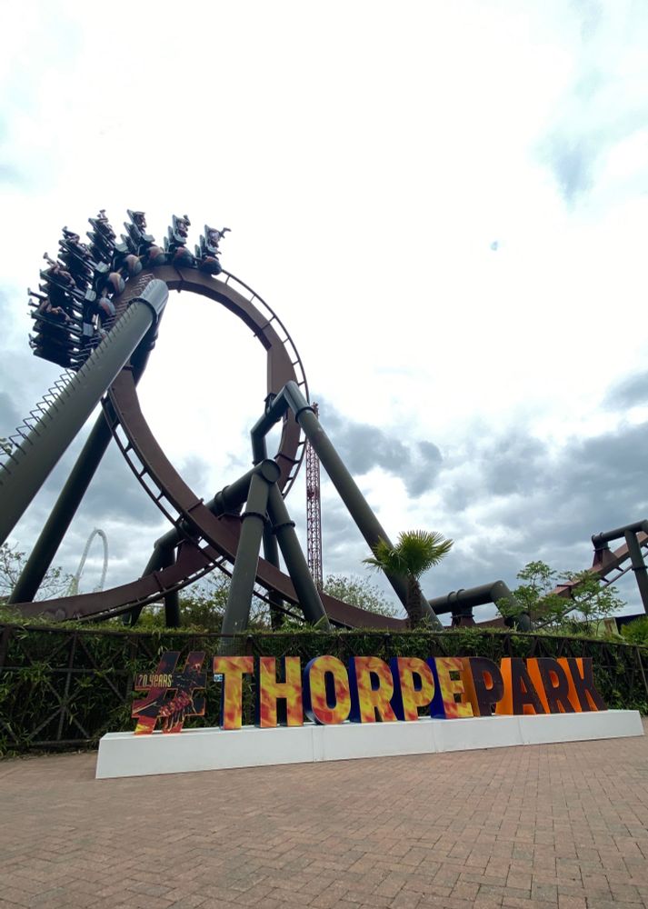 Nemesis Inferno with the hashtag Thorpe Park sign in 20 Years of Nemesis Inferno overlay.