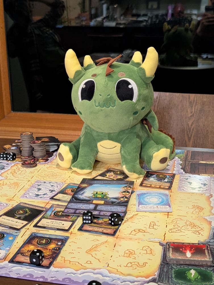 A picture of the Drakorath Jr plush on the fable fury board