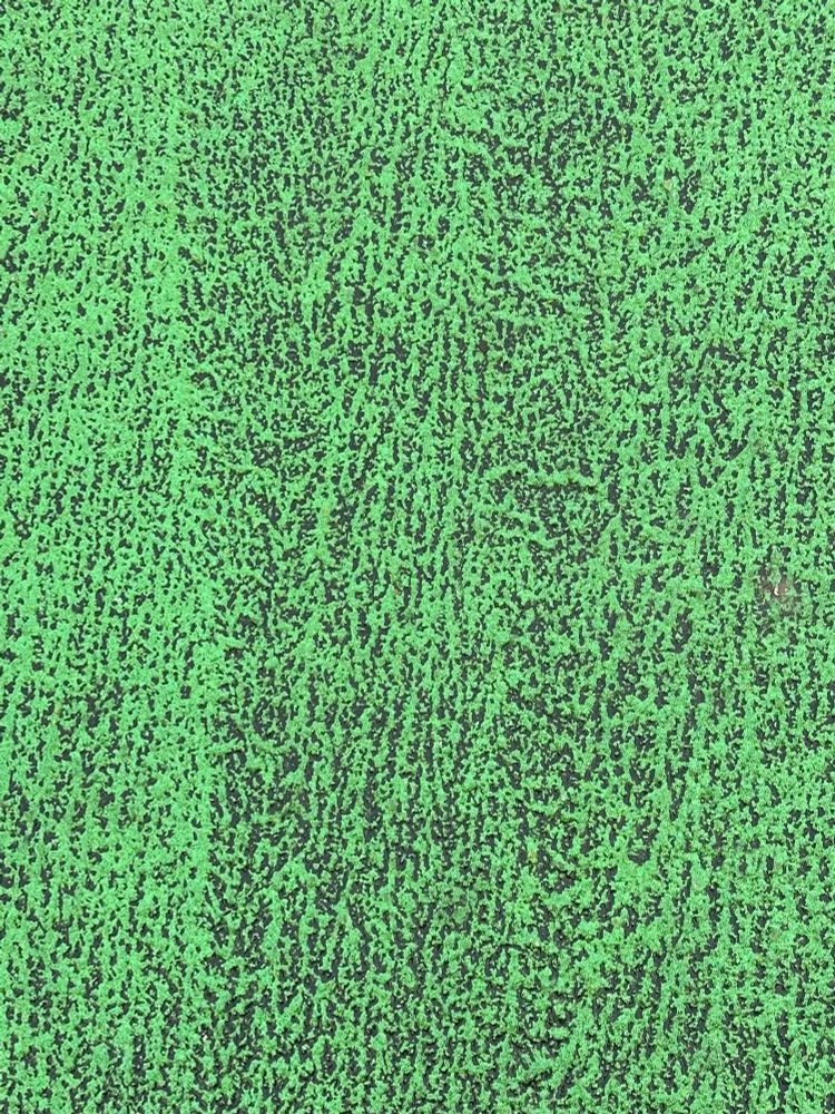 Rough green plastic texture of road markings