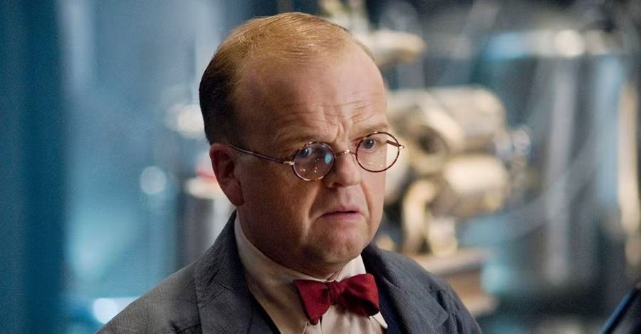 Toby Jones, a nerdy-looking and not very tall man, in some movie where he's wearing glasses and a bow tie. 