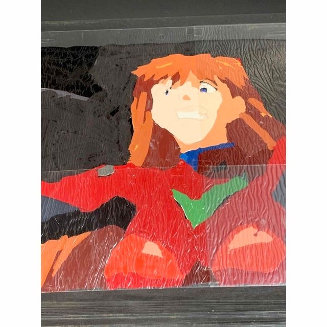 Shows paint bleed through from cel.