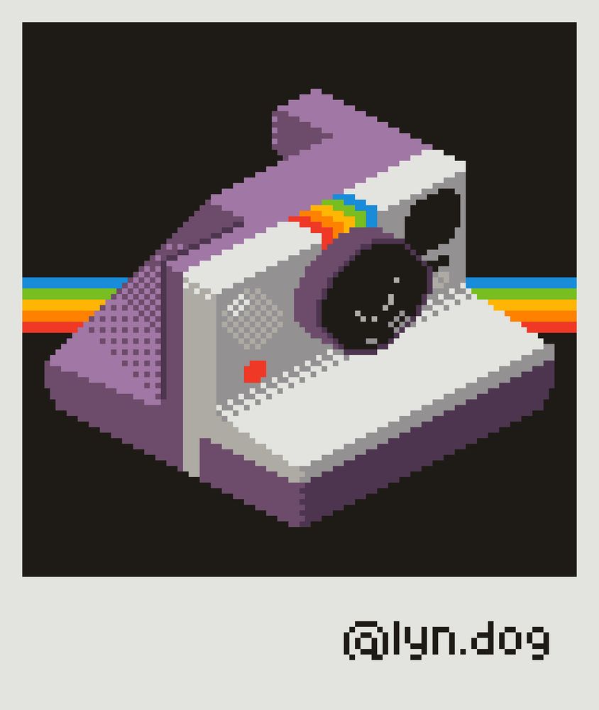 Isometric pixel art of a modern Polaroid camera. It is a purple and white model. The image is framed in a replica of the classic Polaroid framing.