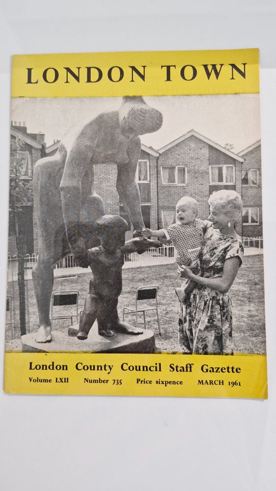 Copy of London Town: London County Council Staff Gazette, March 1961. Cover photo of a sculpture of a mother and child with a real mother and child. The child's hand reaches out to the sculpture.