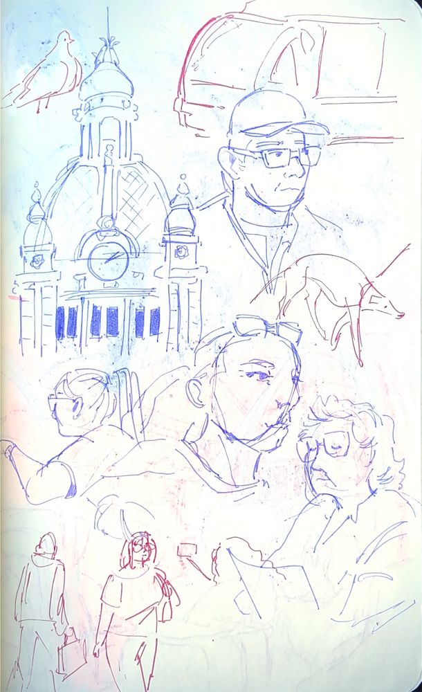 Mainly a sketchbook page with people’s heads. There’s also a bird and building at the top left, a start of a train in the top right, and a dog below that.