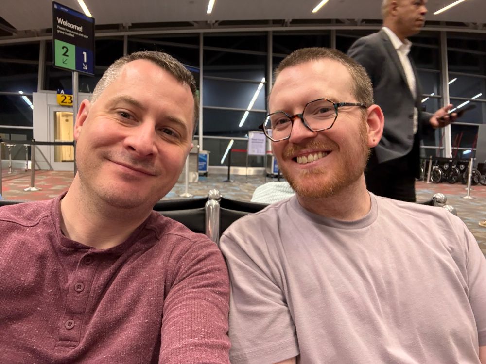 Austin and Colin waiting at the airport for our first flight. 