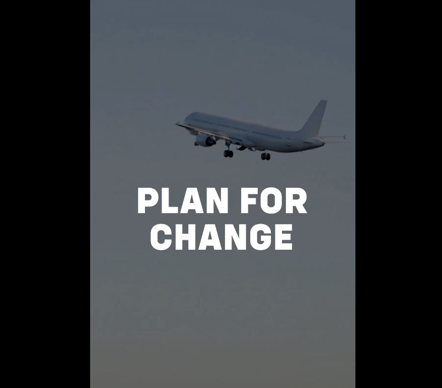 A photo of a plane that has just taken off with the caption 