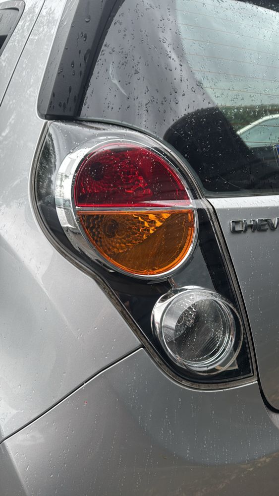 A really clean and undamaged Chevy Spark tail light fitted 48 hours later 