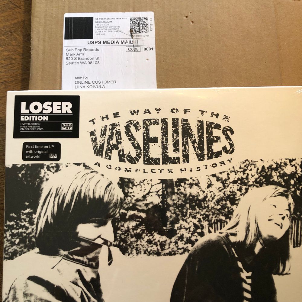 A sealed copy of The Way of the Vaselines LP on top of a cardboard box from Sub Pop Records. 
