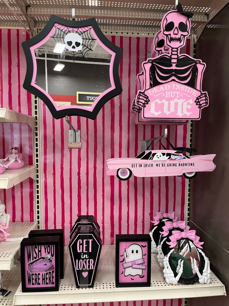 Various black and pink Halloween decorations. 