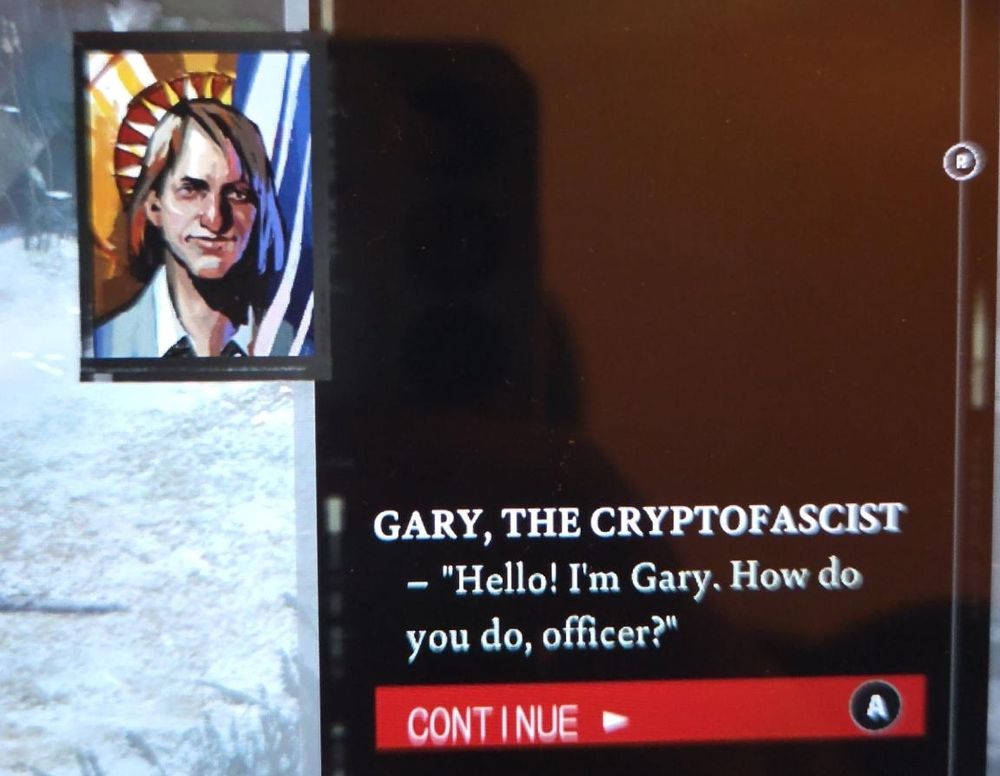 Screenshot aus dem Spiel "disco Elysium". Ein Mann mit langen braunen Haaren, der Gary heißt und cryptofaschist ist, stellt sich vor.