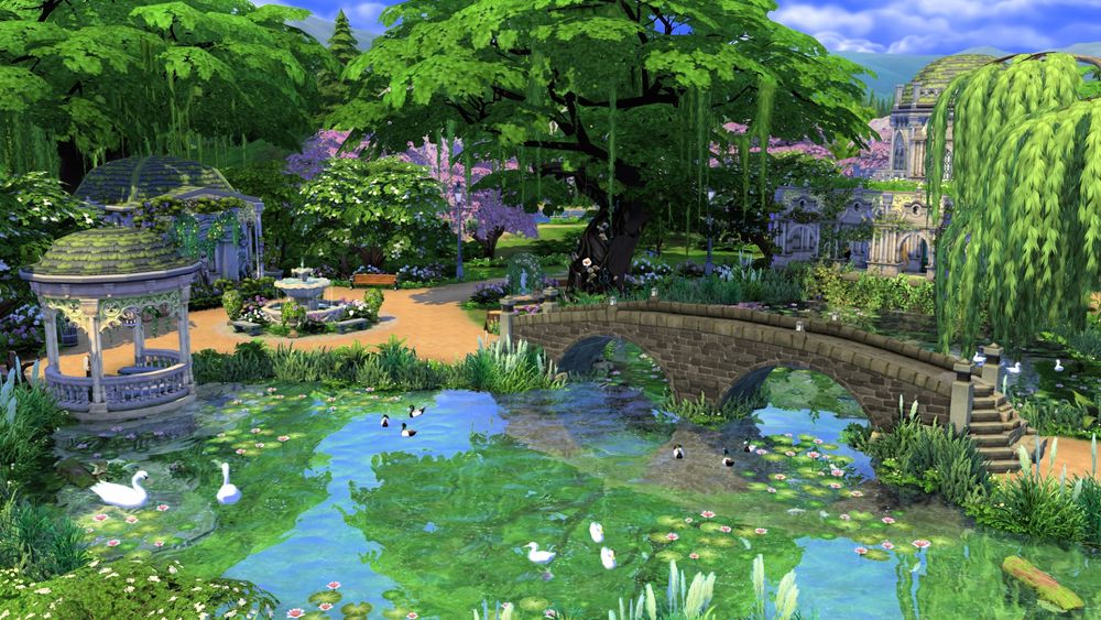 screenshot from the sims 4. a big park with a big lake with waterliies and ducks, a bridge over it and lots of greenery