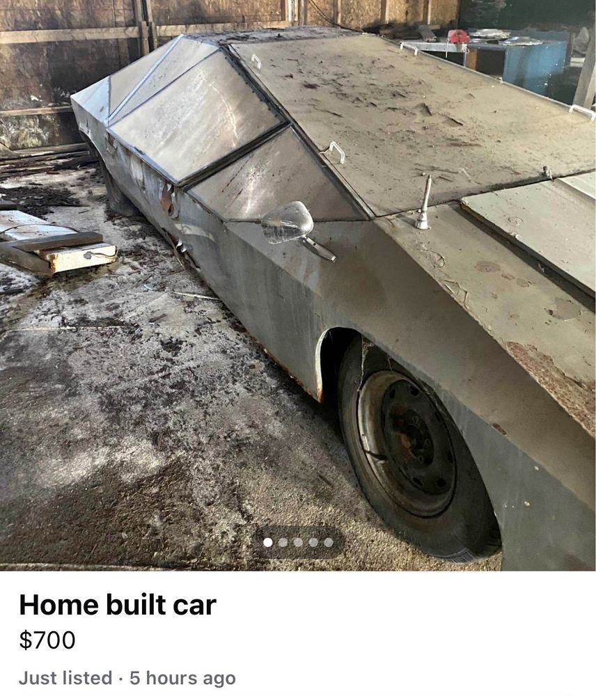 facebook marketplace ad with a super shitty sheet metal car that actually looks a lot like a cybertruck, but like with no windows, for some reason. labeled "home built car, $700"