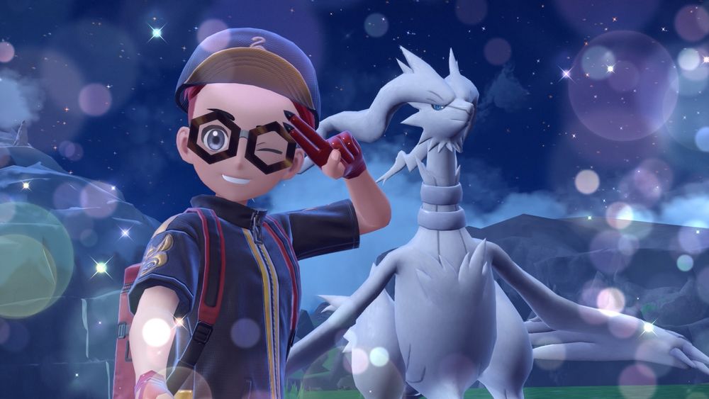 Reshiram looking stoic in a selfie while Fletch salutes