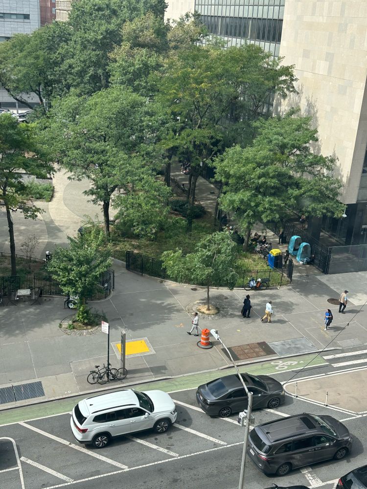 A view of the Manhattan Criminal Courthouse from across the street, where a line has formed.