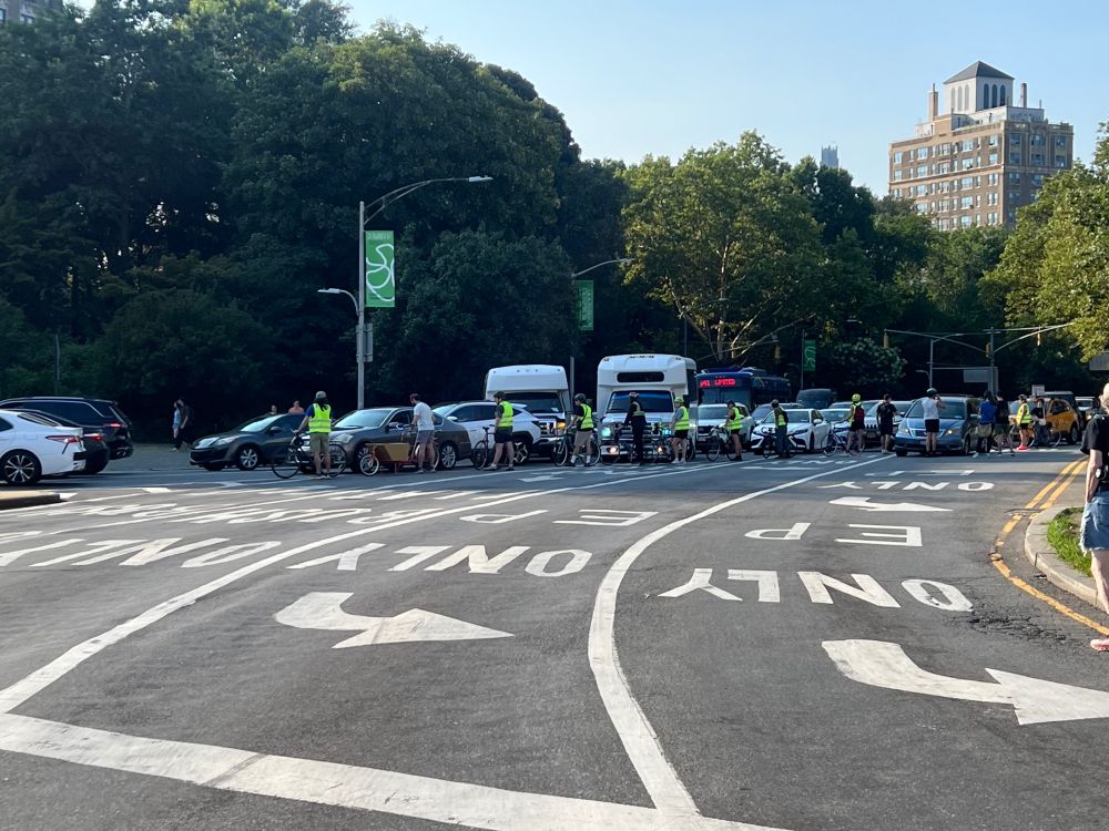 Protesters use bicycles to stop traffic from entering Grand Army Plaza loop.