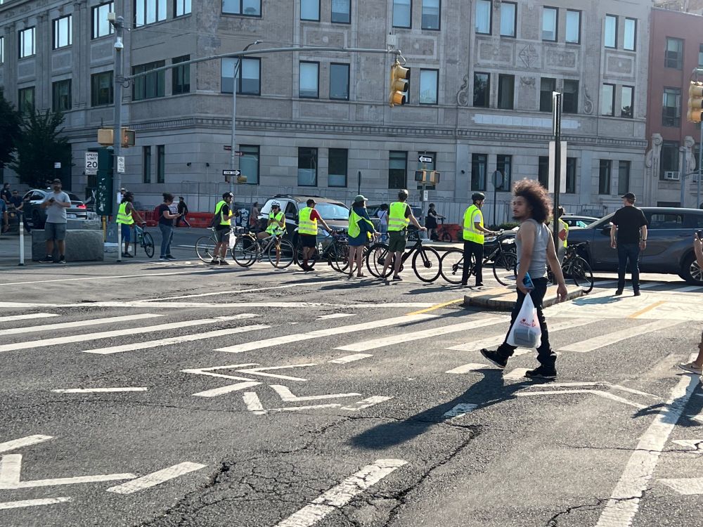 Protesters use bicycles to stop traffic from entering Grand Army Plaza loop.