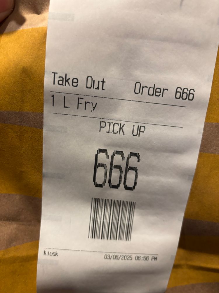 Receipt for a take out order of French fries from McDonald’s, and the number on the order is 666. Clearly satanic fries.