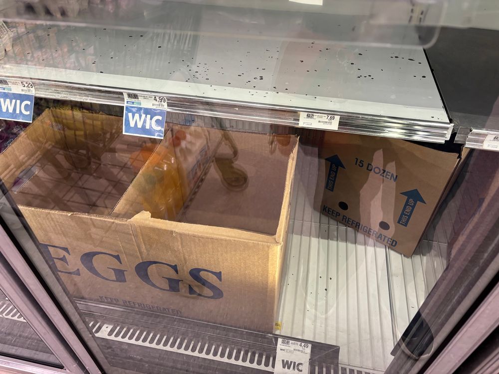 Empty egg boxes at the grocery store 