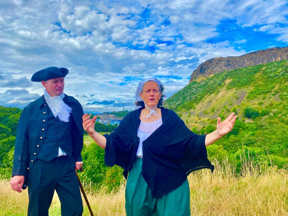 Actors playing Isabella and James Hutton in Holyrood Park, in the "Hutton in Edinburgh" Fringe show.