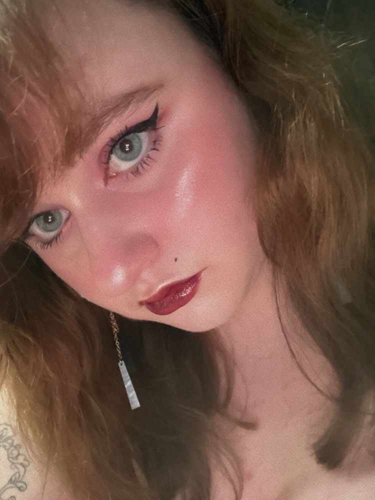 What is she hiding behind those eyes?! 
