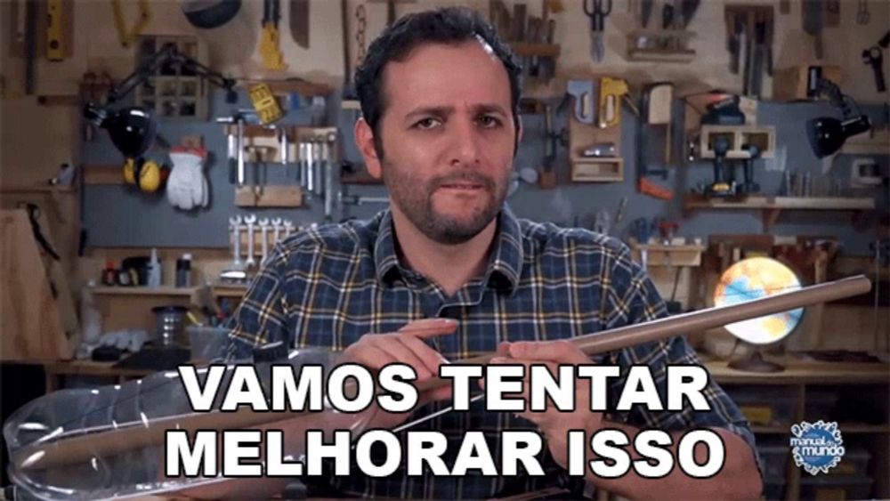 a man in a plaid shirt is holding a wooden stick and says vamos tentar melhorar isso