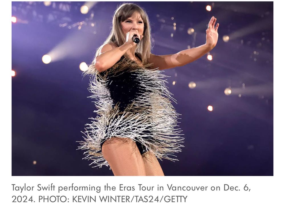 Taylor wears a black dress with silver strands flying and singing. The background is purple.
Caption: Taylor Swift performing the Eras Tour in Vancouver on Dec. 6,
2024. PHOTO: KEVIN WINTER/TAS24/GETTY