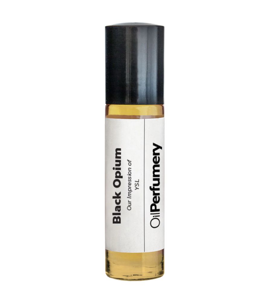 A small rollerball perfume bottle. It’s labeled “Black Opium”, “Our Impression of YSL”, “Oil Perfumery”.
