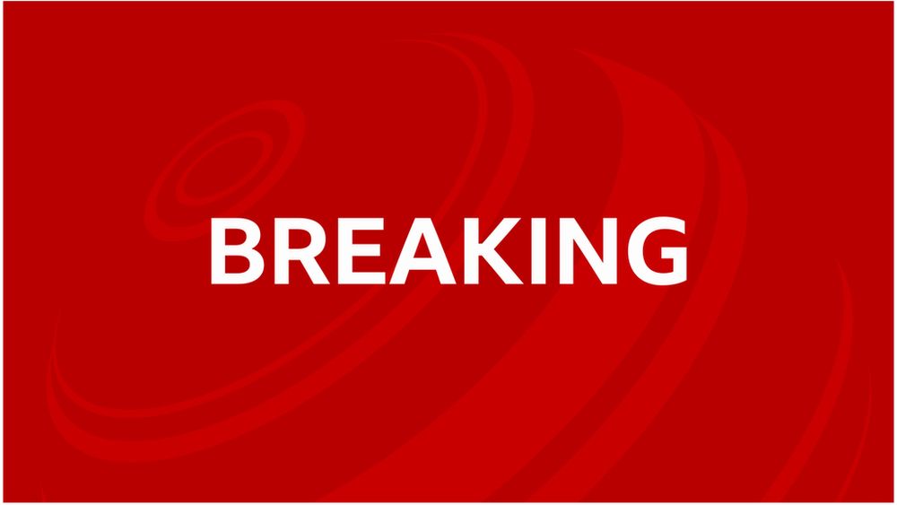 The BBC News breaking news image, a red background with BREAKING in white upper case lettering.