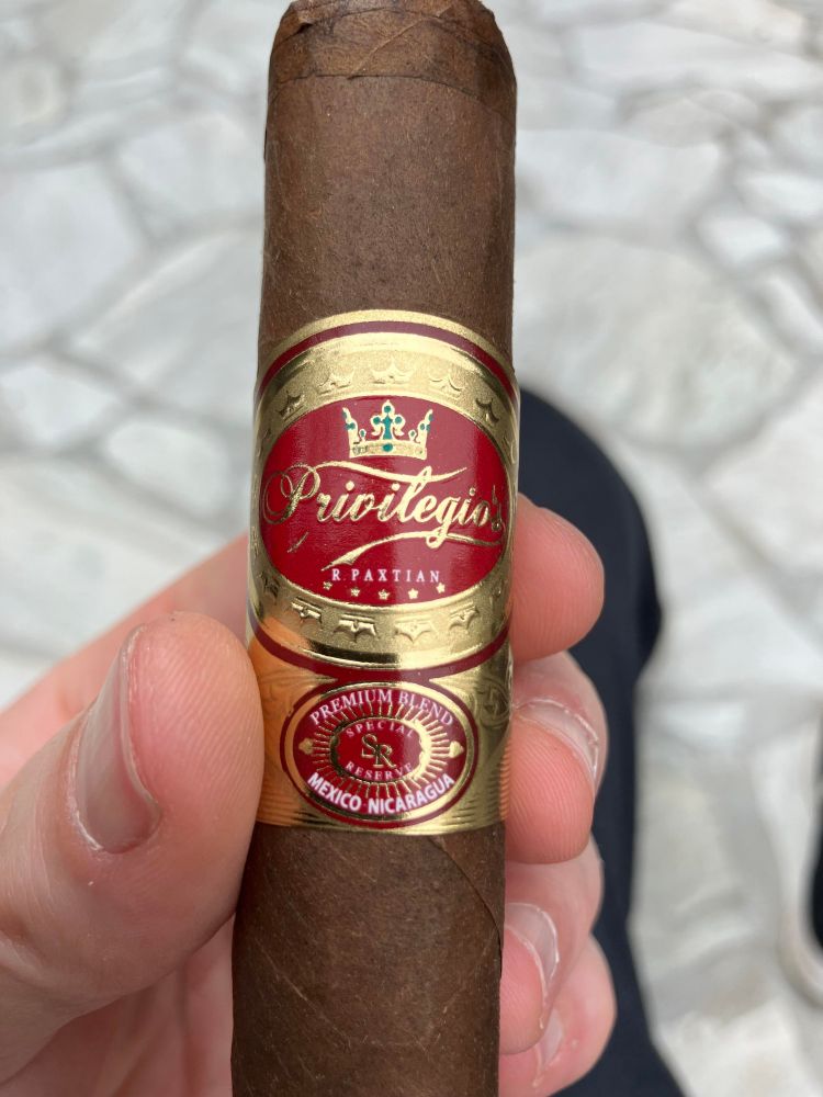 Currently enjoying my last R. PAXTIAN cigar, bought in Mexico exactly two years ago.

It is a blend of Nicaragua and Mexican tobaccos. Very chocolatey. 

I never had a bad PAXTIAN, so if you are visiting Mexico anytime, don’t hesitate to get some of their creations. They do not ship internationally unfortunately but I got them delivered to my hotel back then. That's why you have me , I'll get it to your doorsteps anytime. 
