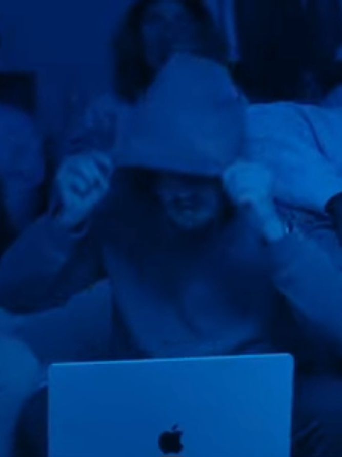 Jorge dramatically pulling the hood of his hoodie over the head