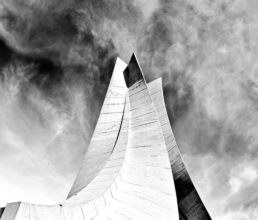 Maqam Echahid or Martyrs Memorial in Algiers rendered in black and white for drama 
