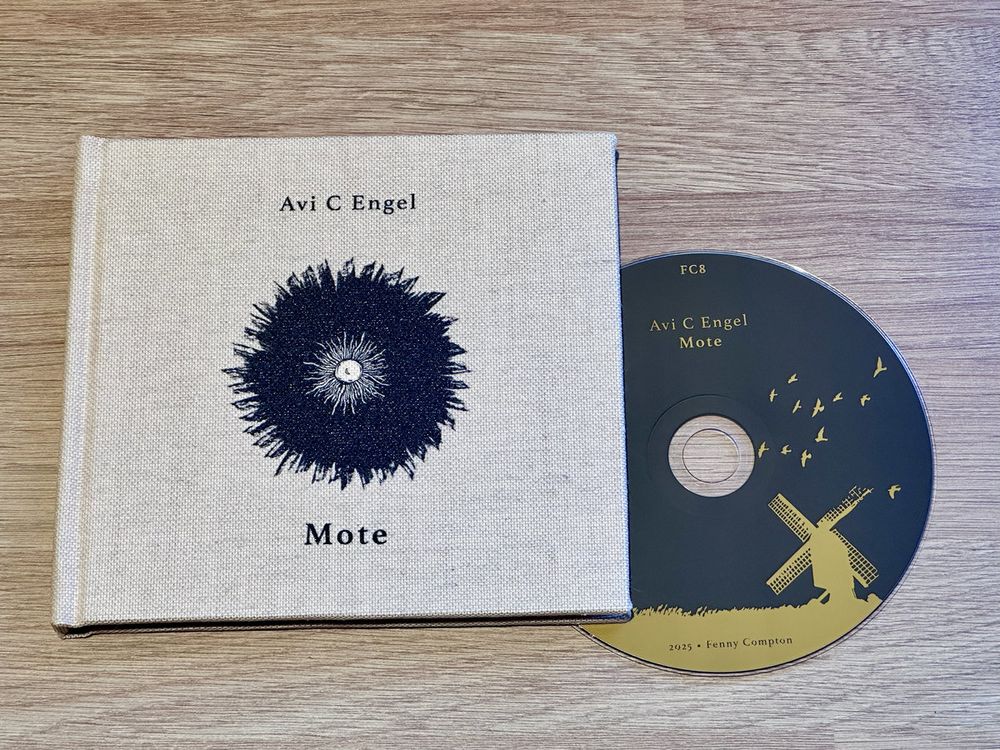 Deluxe hardcover linen-bound edition of Mote cd by Avi C Engel