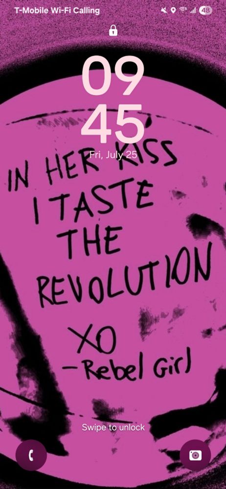 Lock screen that reads: "In her kiss i taste the revolution. -Rebel Girl"