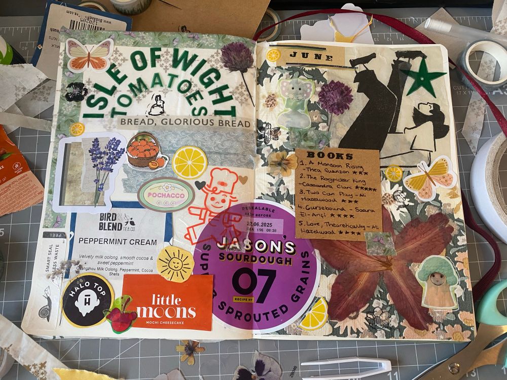 scrapbooking spread in a junk journal style, contains packaging from bread,mochi,ice cream, kewpie mayo, loose leaf tea and tomatoes. small stickers and stamps decorate the page with lemons, butterflies and flowers