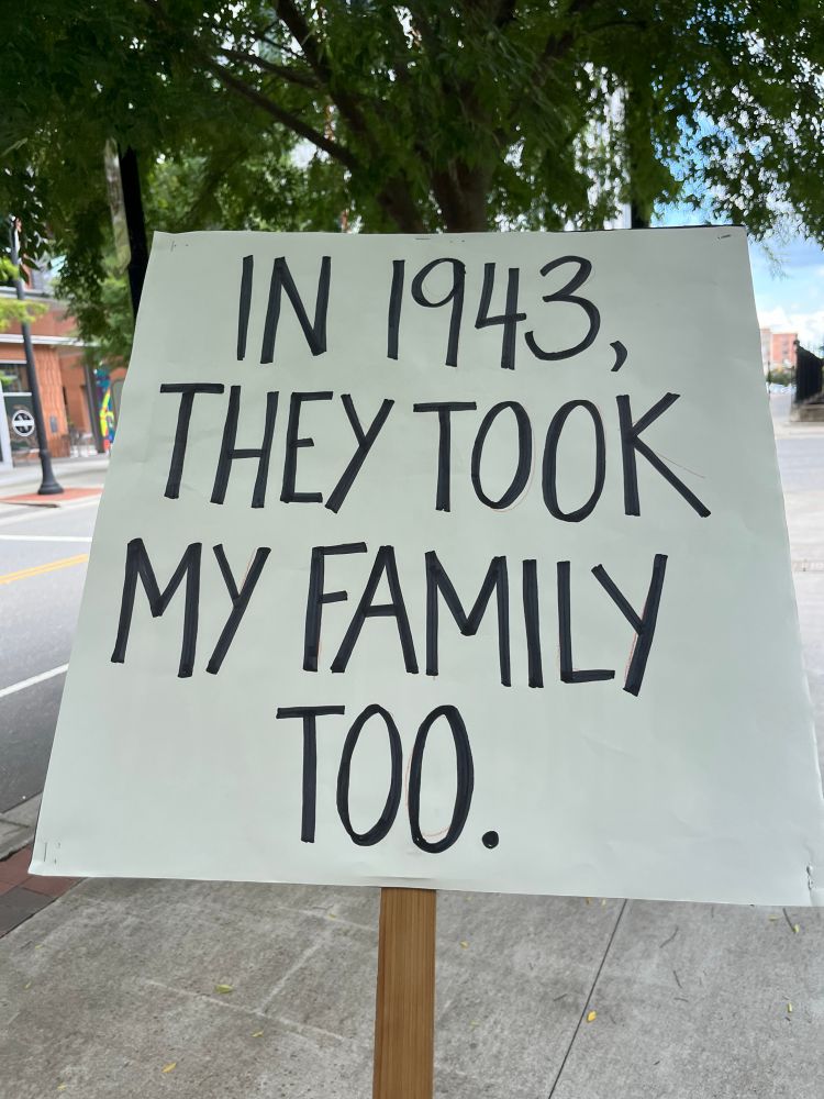 Protest sign: in 1943 they took my family too