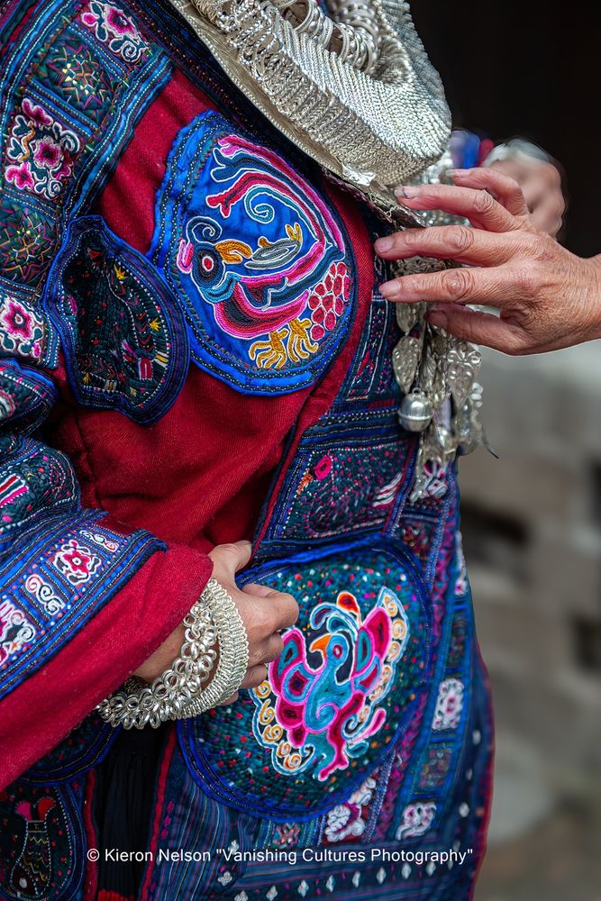 Some Miao costumes preserve ancient styles from the Han Dynasty (206 BC–AD 220), which have disappeared elsewhere in China. This preservation has led to comparisons with "Living Terra Cotta Warriors," highlighting their role as a living archive of historical dress. The intricate craftsmanship, including embroidery, batik dyeing, and silver ornaments, reflects centuries-old techniques passed down through generations

