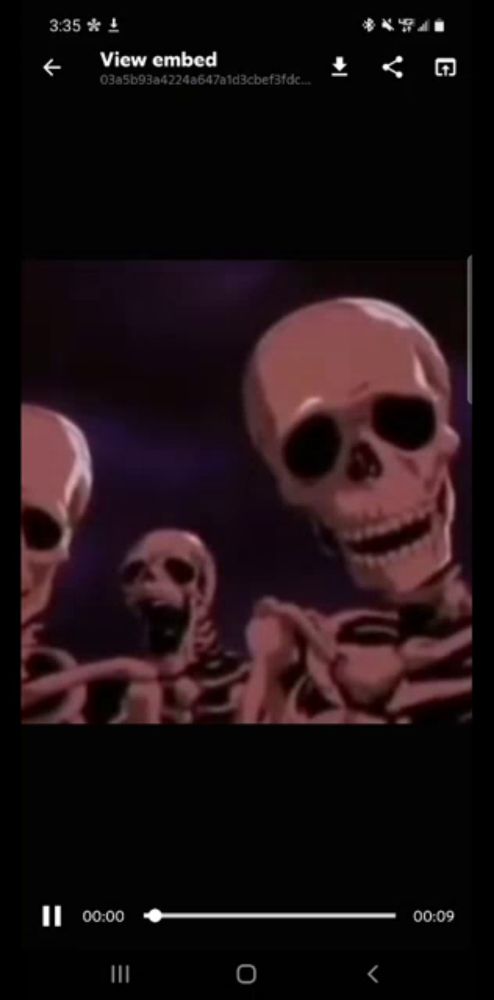 a video of skeletons is being viewed on a cell phone