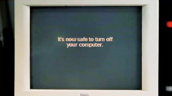 A monitor displaying Windows 95’s “it’s now safe to turn off your computer” screen. 