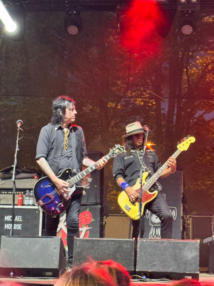 Rich Jones, guitarist, and Sami Yaffa, bassist, rock it with a purple Hagstrom Viking and a yellow Fender Bass.