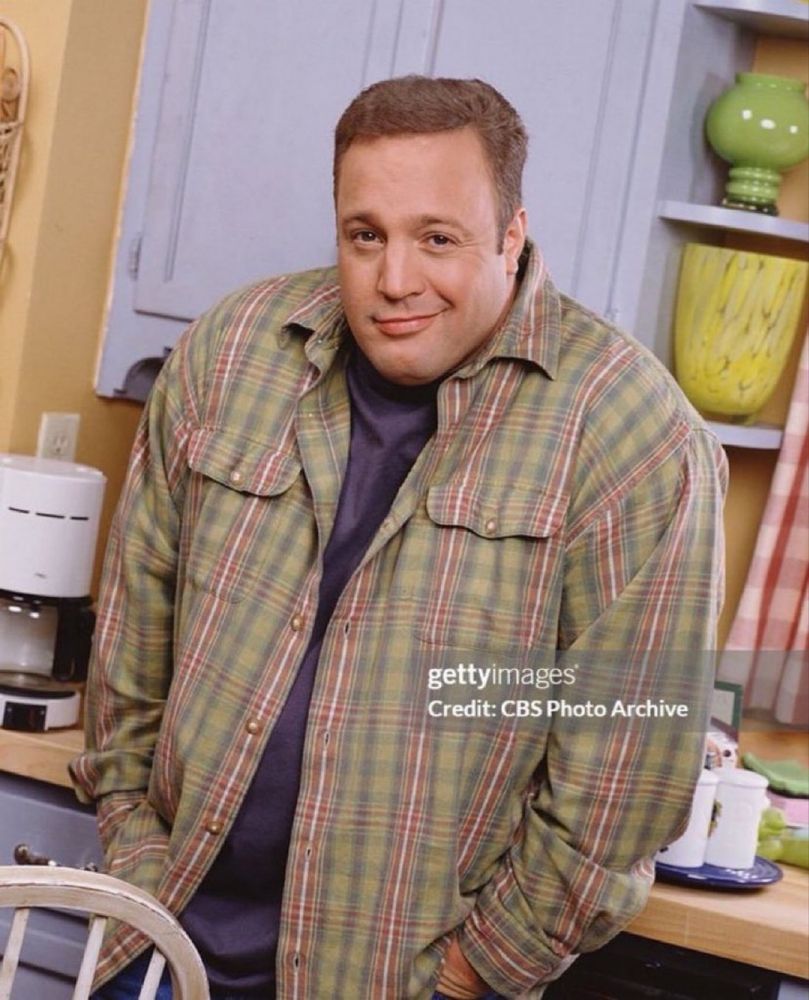 kevin james half-smiling sheepishly